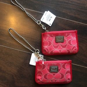 Two matching Coach coin purses